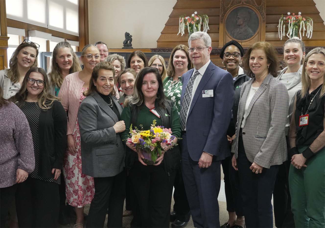 A photograph of the entire Human Resources team gathered with HR Chief Pat Borek and BHS CEO Darlene Rodowicz