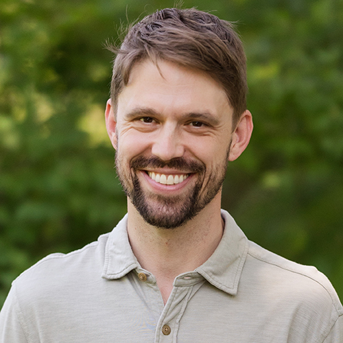 A photograph of Adam Hetland, DO