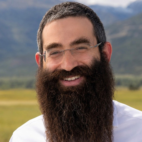 A photograph of Ari Goldwaser, DO