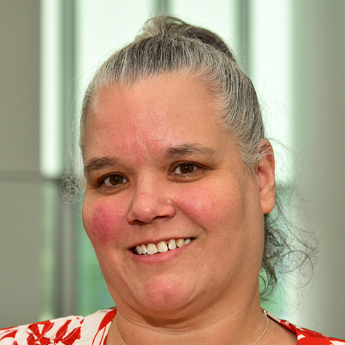 A photograph of Katrina Curtiss, APRN;