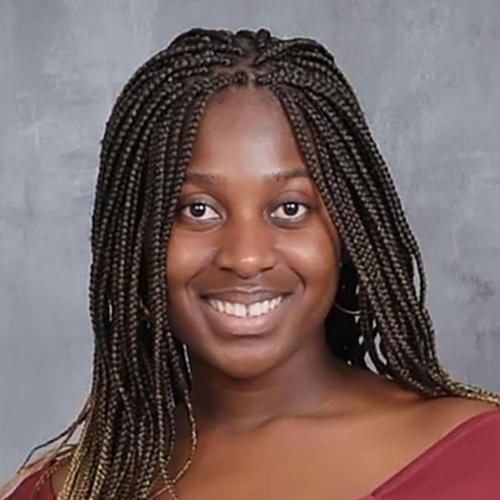 A photograph of Prinsla Baffoe-Bonnie, FNP-BC, APRN, MHA, MSN, NP